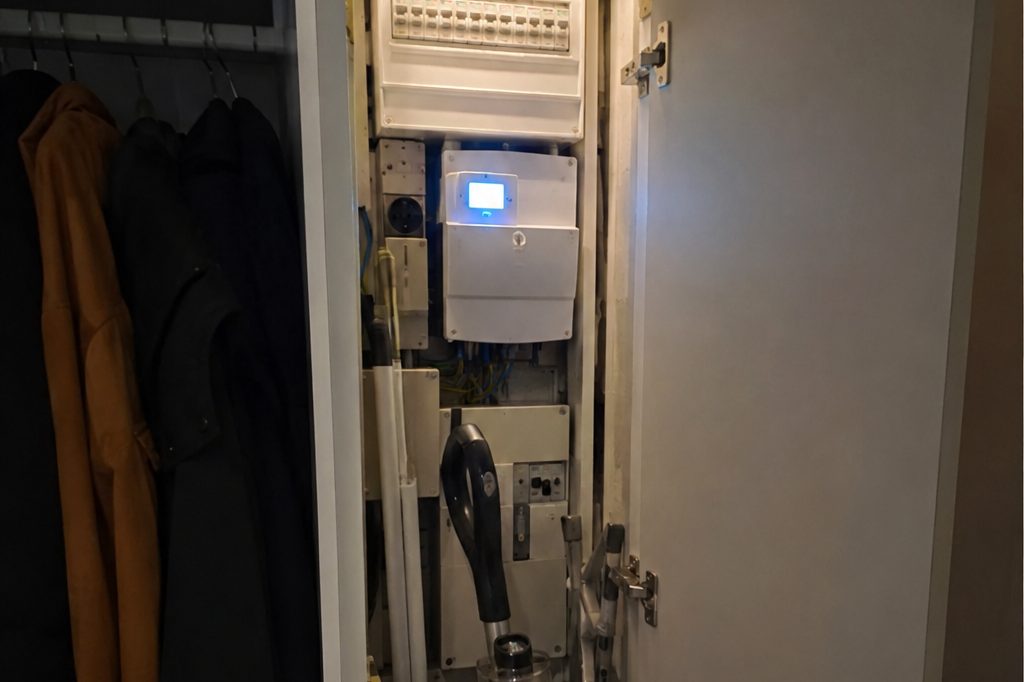 A fuse box in a hallway cupboard